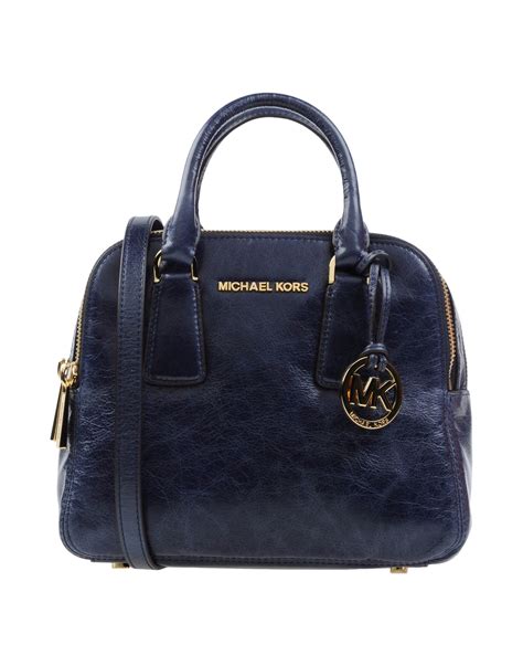 dark blue michael kors purse